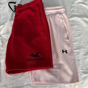 Hollister Men's Vibrant Red Athletic Shorts and under Armour light pink shorts